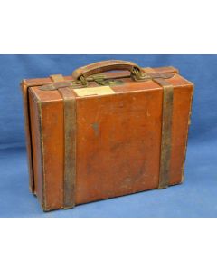“Leather cartridge magazine for shotgun shell storage and quick access in the field”

