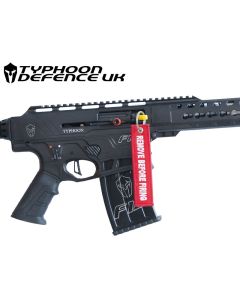 Bright Typhoon F12 breech flag inserted into shotgun action

