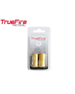 TrueFire brass snap caps lined up on bench


