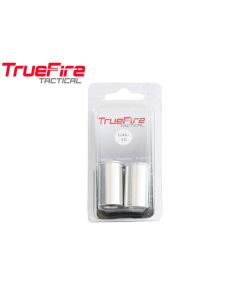 TrueFire aluminium snap caps stacked in row on table

