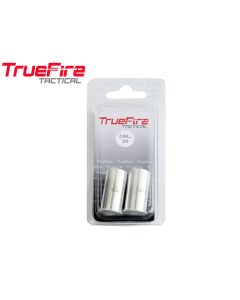 TrueFire aluminium snap caps stacked in row on table

