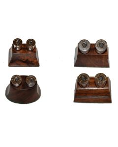 The holder for these prestige custom 12g snap caps is made of an old English stock.