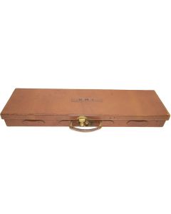 William Powell tan leather shotgun case with brass fittings on bench

